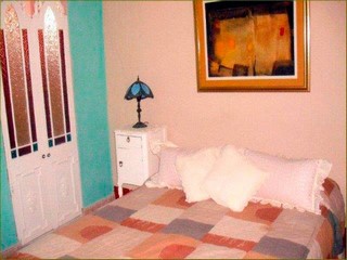 Habitación con cama adicional en la Habana